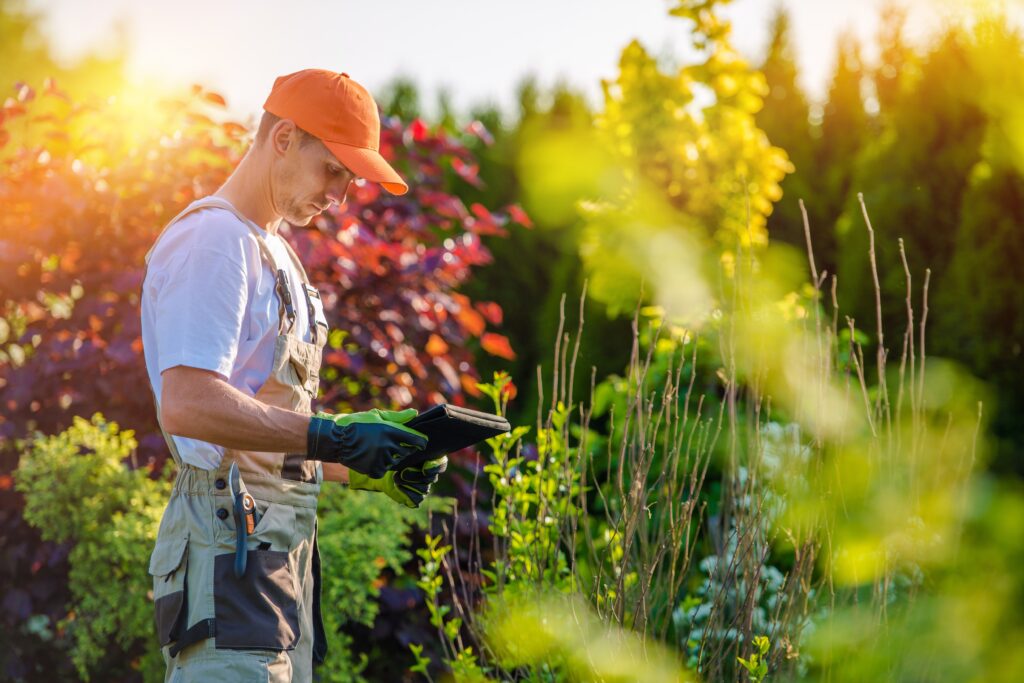 Lawn care professional confirming job price before starting work Greenwood Lawn Care Bend Oregon